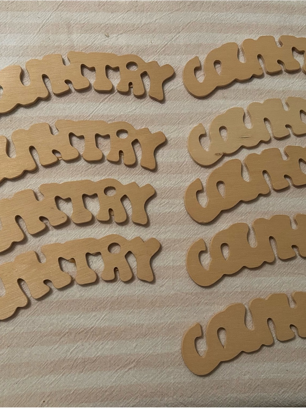 Small vintage wooden county signs